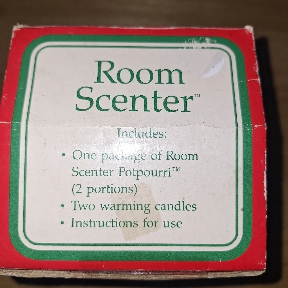 A Potpourri Press Room Scenter in the original box. Pre-loved on good shape.
